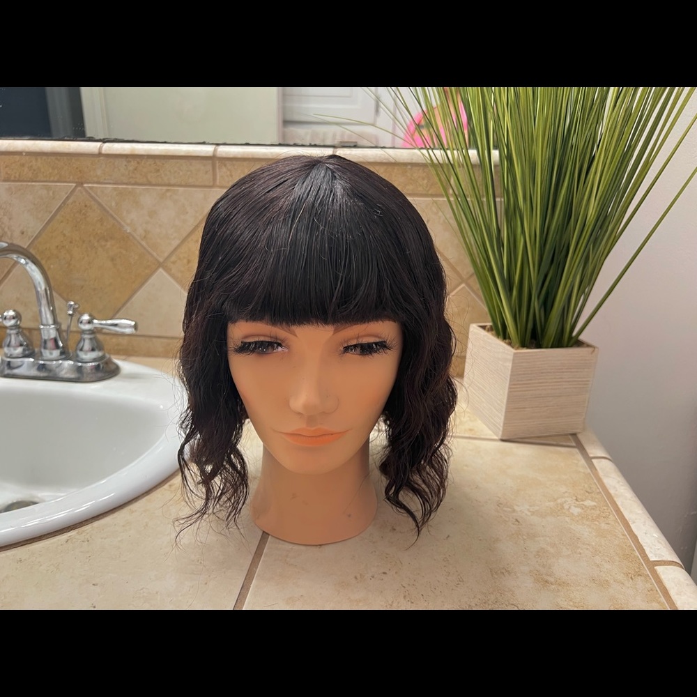Wavy permed human wig